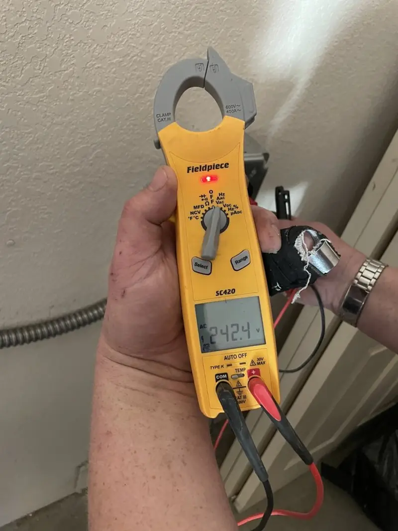 Voltage testing with clamp meter during Recessed Lighting Installation in Santa Clara